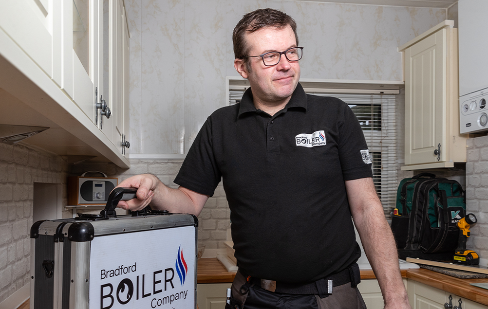 New combi boiler service Bradford Julian our head engineer servicng a Combi boiler in a customers home